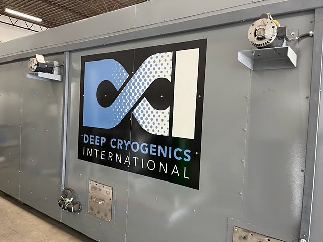 Side of a DCI 36K treatment chamber with the DCI logo panel