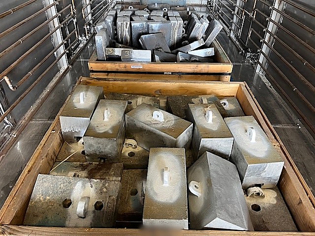 Crates of steel liners inside a DCI chamber