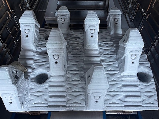 A platen casting covered in frost inside a DCI chamber